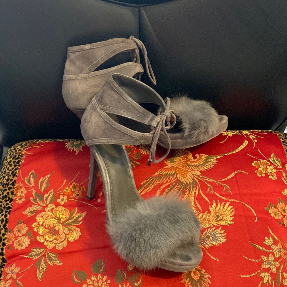 Focusing on the details in gray fur and suede sandals by Michael Kors!